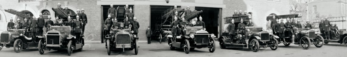 Vintage fire trucks and fire men